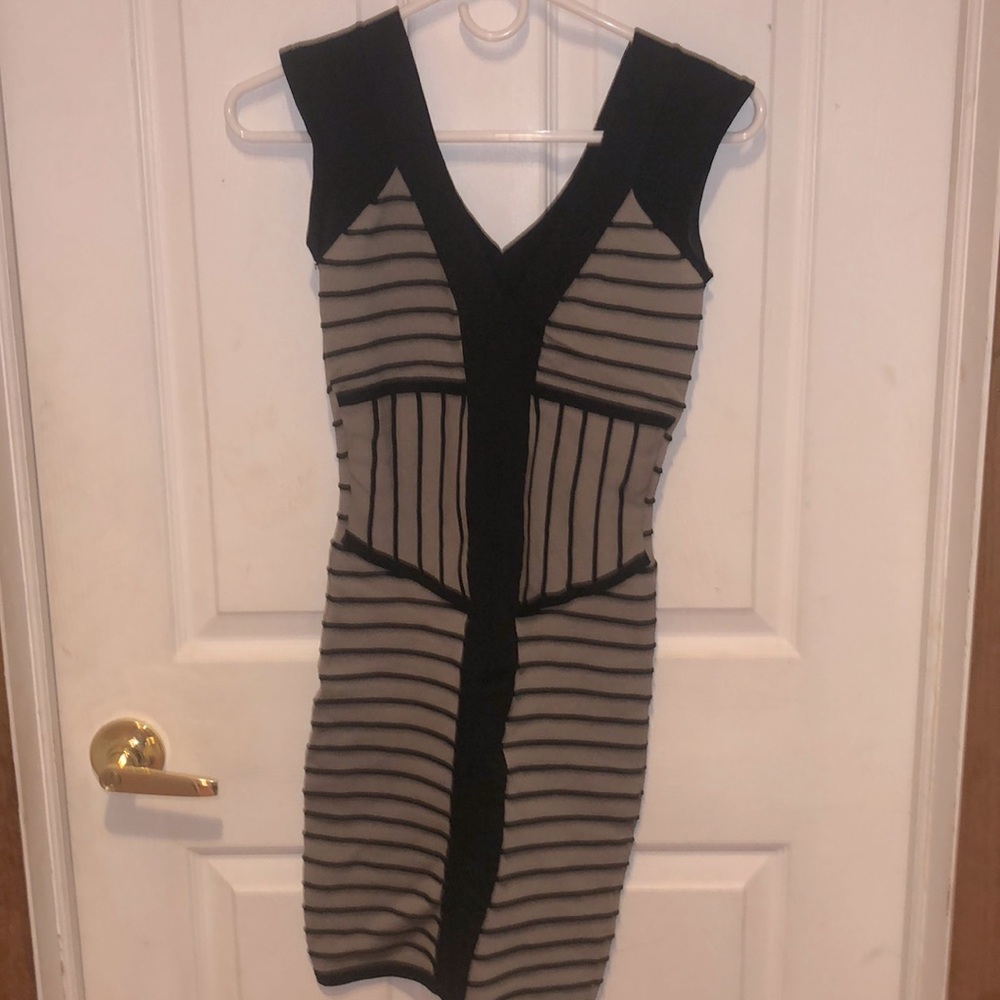 Black and gray 2b Bebe dress in the size extra small